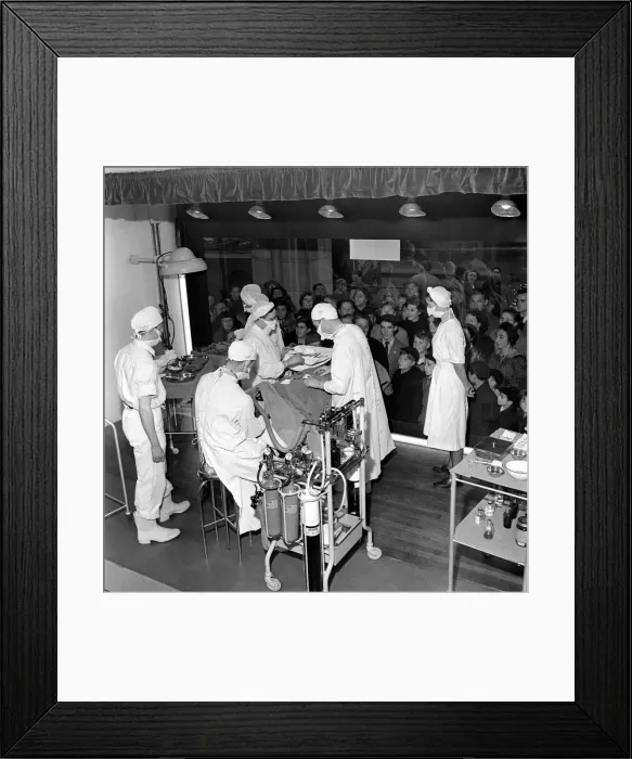 Framed Print : Surgical operation and how a operating theatre works is demonstrated to members of Framed Print : Surgical operation and how a operating theatre works is demonstrated to members of