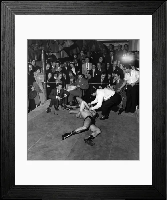 Framed Print : The A and A Social Club, a West End jazz club, staged a wrestling match as an extra