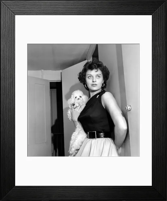 Framed Print : Actress Miss Elizabeth Webb with her poodle whose name is Skoshi. October 1953 D6060