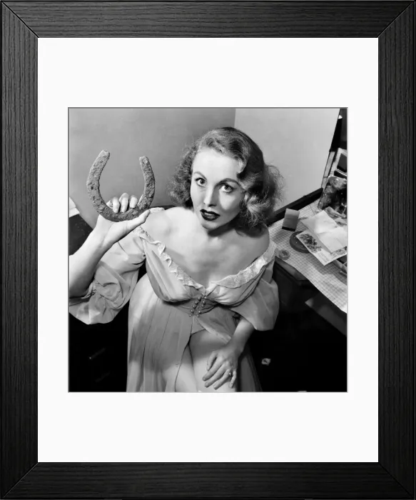 Framed Print : Hazel Count: Seen here with a horse shoe in her dressing gown. September 1953 D5536-003 Framed Print : Hazel Count: Seen here with a horse shoe in her dressing gown. September 1953 D5536-003