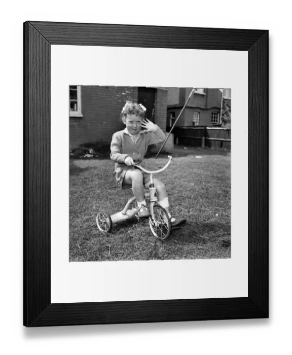 Framed Print : Child playing in garden. August 1953 D5235-008 Framed Print : Child playing in garden. August 1953 D5235-008