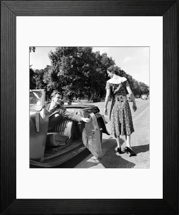 Framed Print : Romance. A young man picks his date up in his car. August 1953 D5205 Framed Print : Romance. A young man picks his date up in his car. August 1953 D5205