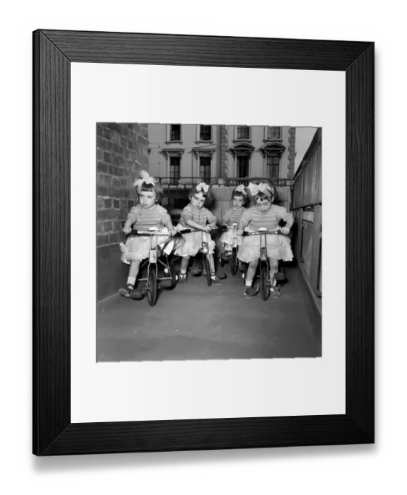 Framed Print : Children quads: the Cole quads seen here on their new bikes which were birthday presents Framed Print : Children quads: the Cole quads seen here on their new bikes which were birthday presents