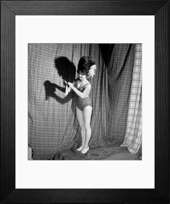 Framed Print : Pretty 19-years-old Pat Landon could almost be accused of cutting up the curtains for her Framed Print : Pretty 19-years-old Pat Landon could almost be accused of cutting up the curtains for her