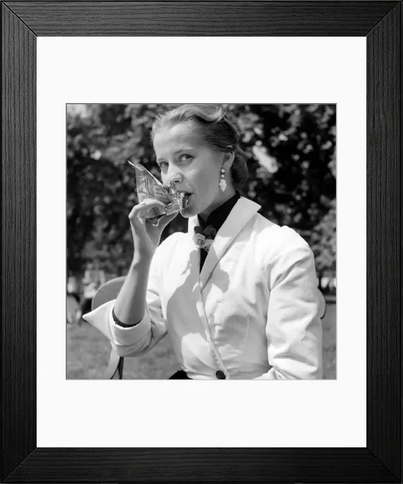 Framed Print : Woman: Food: Kirshan Simone seen here eating a chocolate bar. August 1953 D4094 Framed Print : Woman: Food: Kirshan Simone seen here eating a chocolate bar. August 1953 D4094