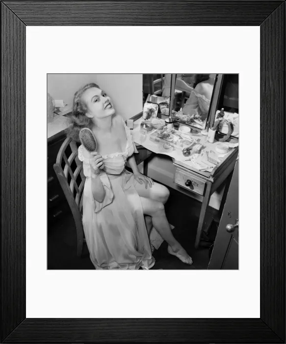Framed Print : Hazel Count: Seen here with a horse shoe in her dressing gown. September 1953 D5536-002 Framed Print : Hazel Count: Seen here with a horse shoe in her dressing gown. September 1953 D5536-002