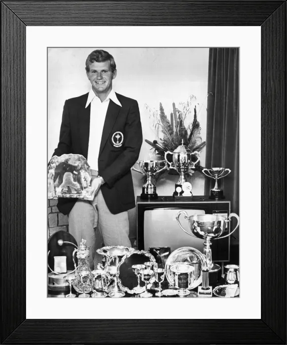 Framed Print : Sandy Lyle at home with his European Trophy collection. October 1979 Framed Print : Sandy Lyle at home with his European Trophy collection. October 1979