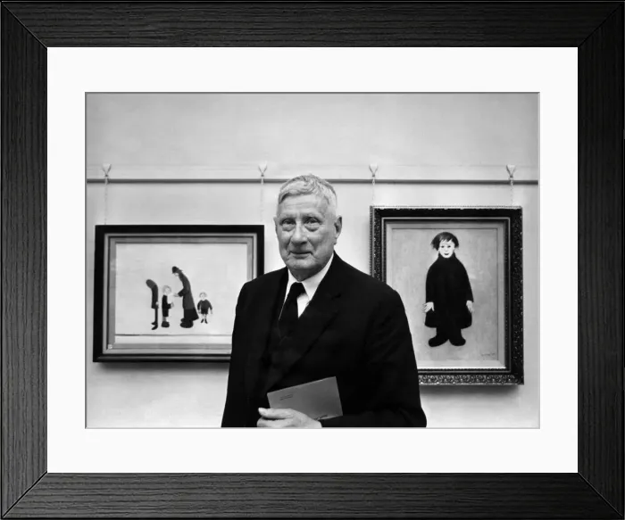 Framed Print : Mr Ls Lowry made a freeman of Salford. Mr Lowry stands between to of his early paintings