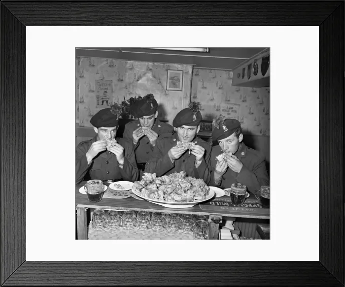 Framed Print : Military Army Food. Soldiers of the Irish Rangers eating pigs trotters in the London Inn Framed Print : Military Army Food. Soldiers of the Irish Rangers eating pigs trotters in the London Inn