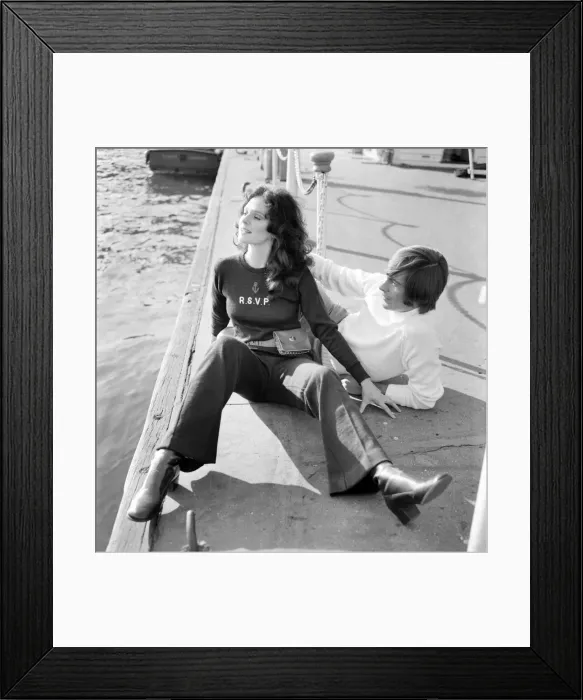Framed Print : Couple wearing the latest leisurewear pose by a boat. November 1969 Z10672-006 Framed Print : Couple wearing the latest leisurewear pose by a boat. November 1969 Z10672-006