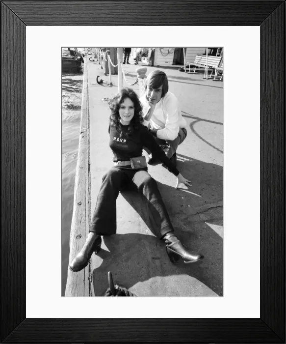 Framed Print : Couple wearing the latest leisurewear pose by a boat. November 1969 Z10672-001 Framed Print : Couple wearing the latest leisurewear pose by a boat. November 1969 Z10672-001