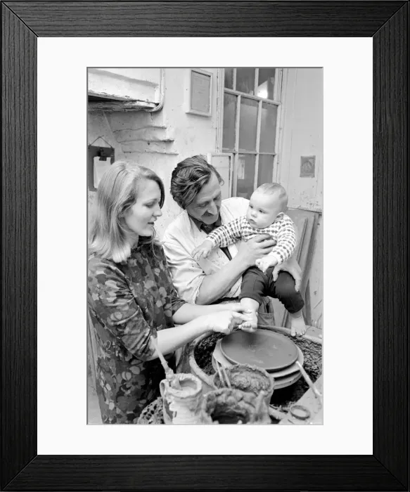 Framed Print : 11 month old Roy Crosland has his footprint cast by making a imprint on the wet clay Framed Print : 11 month old Roy Crosland has his footprint cast by making a imprint on the wet clay