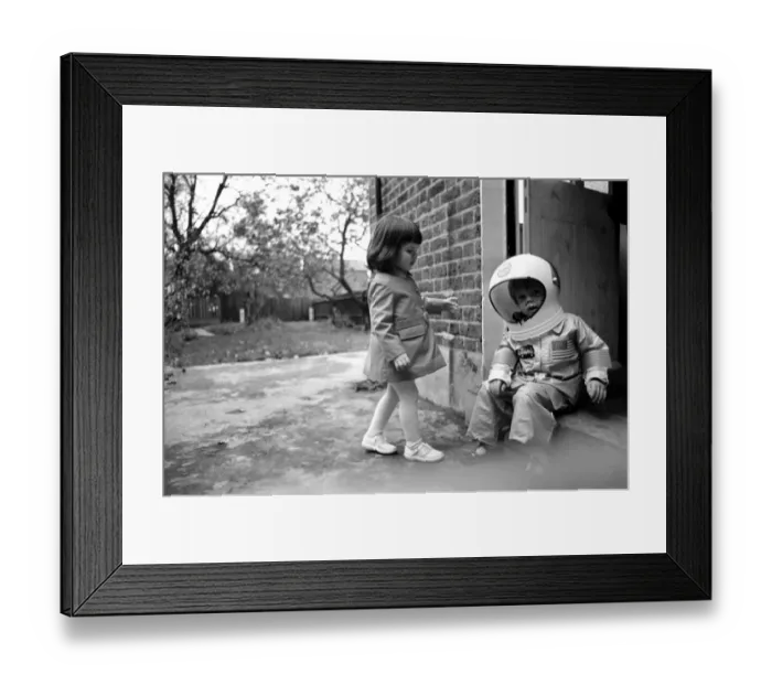 Framed Print : Mark Diment wearing a space-suit in the garden of Chancellor Grove House with his 18