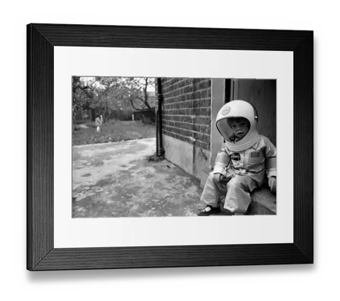 Framed Print : Mark Diment wearing a space-suit in the garden of Chancellor Grove House November