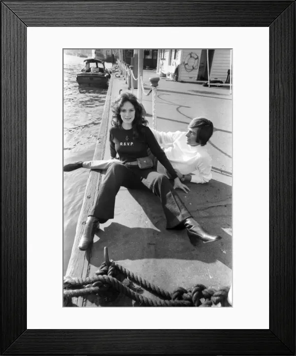 Framed Print : Couple wearing the latest leisurewear pose by a boat. November 1969 Z10672-003 Framed Print : Couple wearing the latest leisurewear pose by a boat. November 1969 Z10672-003