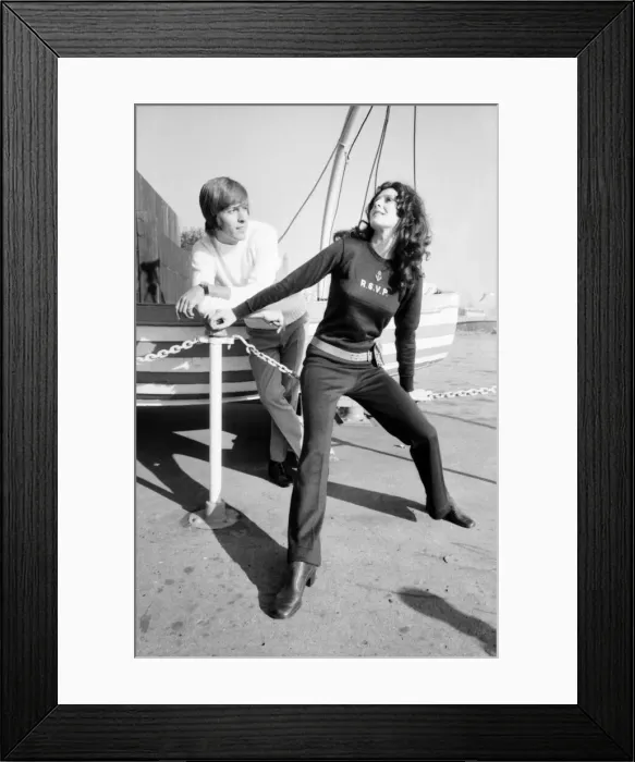 Framed Print : Couple wearing the latest leisurewear pose by a boat. November 1969 Z10672-004 Framed Print : Couple wearing the latest leisurewear pose by a boat. November 1969 Z10672-004