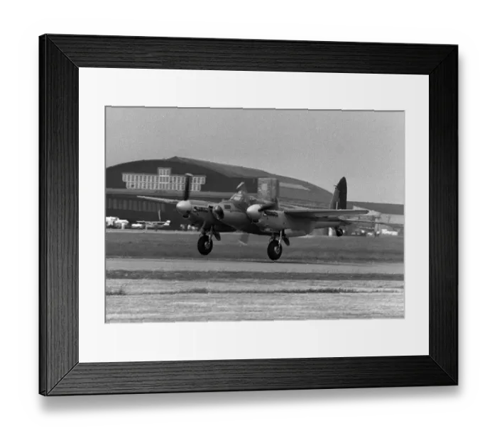 Framed Print : DeHavilland Mosquito takes off from Liverpool Airport where it has been rebuilt to fly