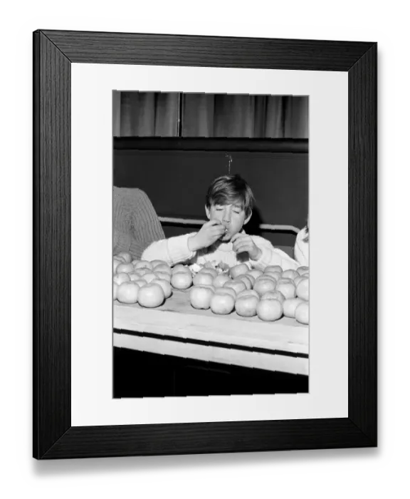 Framed Print : Records: Humour: Children: Meet Guenter Kuhn the 14 years old world champion orange eater Framed Print : Records: Humour: Children: Meet Guenter Kuhn the 14 years old world champion orange eater