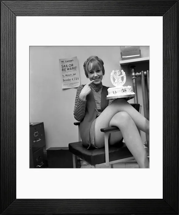 Framed Print : Humour: Woman posing with a wedding cake pulling funny facial expressions Framed Print : Humour: Woman posing with a wedding cake pulling funny facial expressions