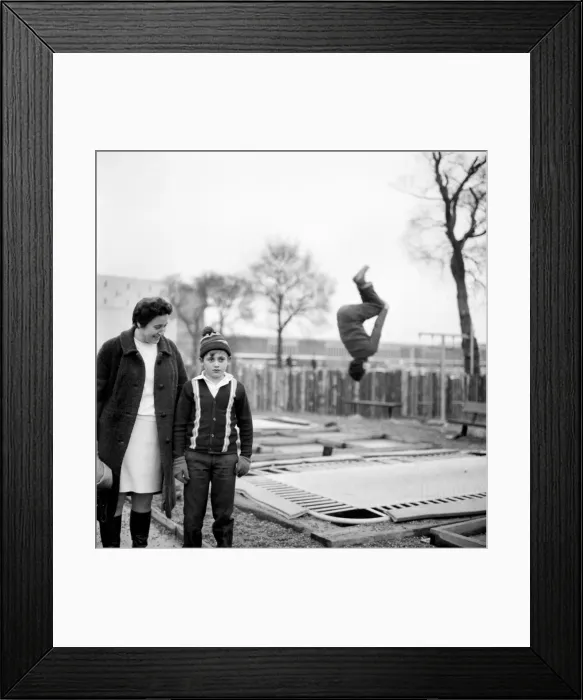 Framed Print : A mother who came to collect her son from the adventure playground, Basildon town centre Framed Print : A mother who came to collect her son from the adventure playground, Basildon town centre