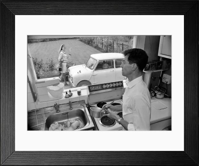 Framed Print : A man a woman living in a sububan area of Manchester at home Framed Print : A man a woman living in a sububan area of Manchester at home