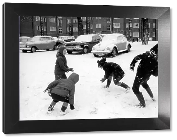 Weather: Winter Scenes: Children from the Grange estate East Finchley take advantage of