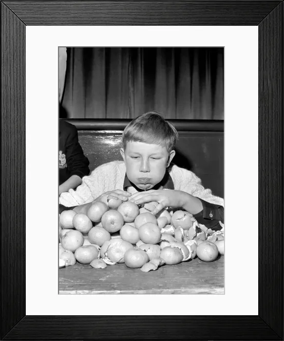 Framed Print : Records: Humour: Children: Meet Guenter Kuhn the 14 years old world champion orange eater Framed Print : Records: Humour: Children: Meet Guenter Kuhn the 14 years old world champion orange eater