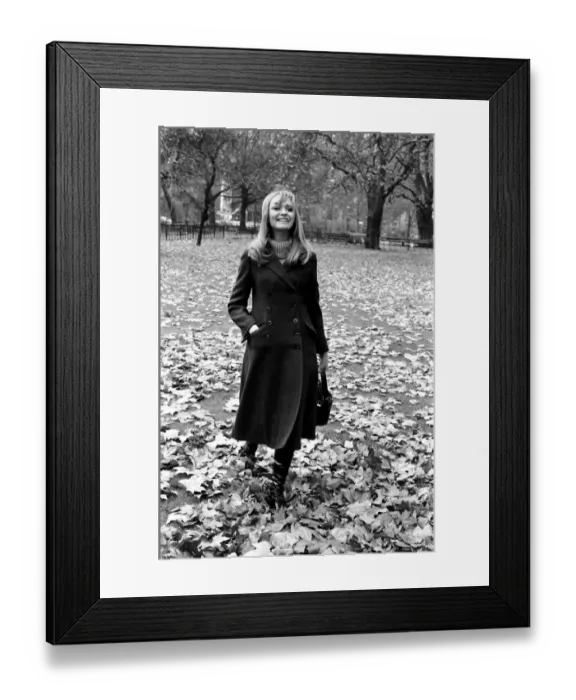 Framed Print : Fashion Clothing. Woman Model: Blanche Webb wearing the midi coat Framed Print : Fashion Clothing. Woman Model: Blanche Webb wearing the midi coat