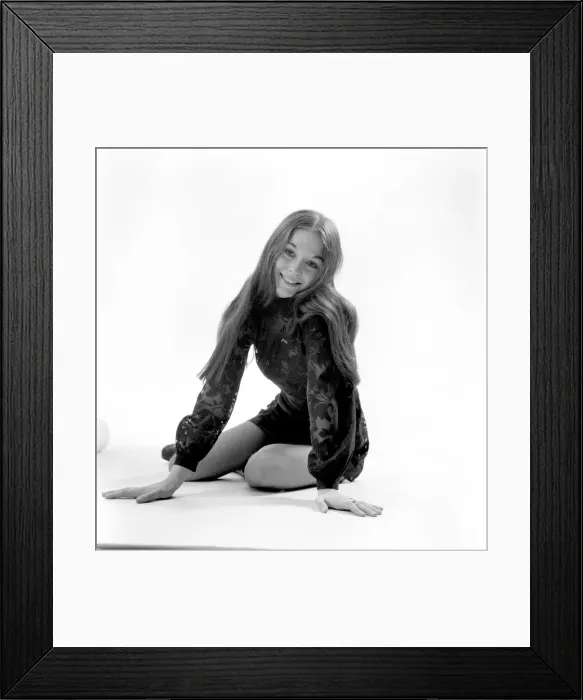 Framed Print : Woman poses in the studio wearing a black mini dress. December 1969 Z11850-001 Framed Print : Woman poses in the studio wearing a black mini dress. December 1969 Z11850-001