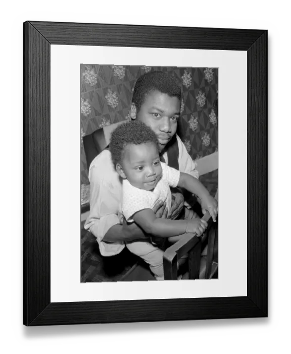 Framed Print : Father with his toddler son. December 1969 Z11609