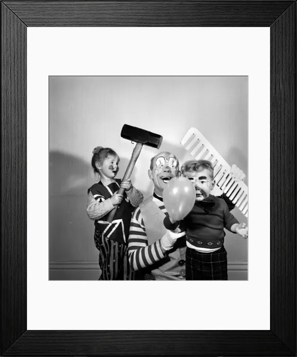 Framed Print : Four year old girl learning how to be a clown like her daddy. Blackpool clown Ernie Framed Print : Four year old girl learning how to be a clown like her daddy. Blackpool clown Ernie