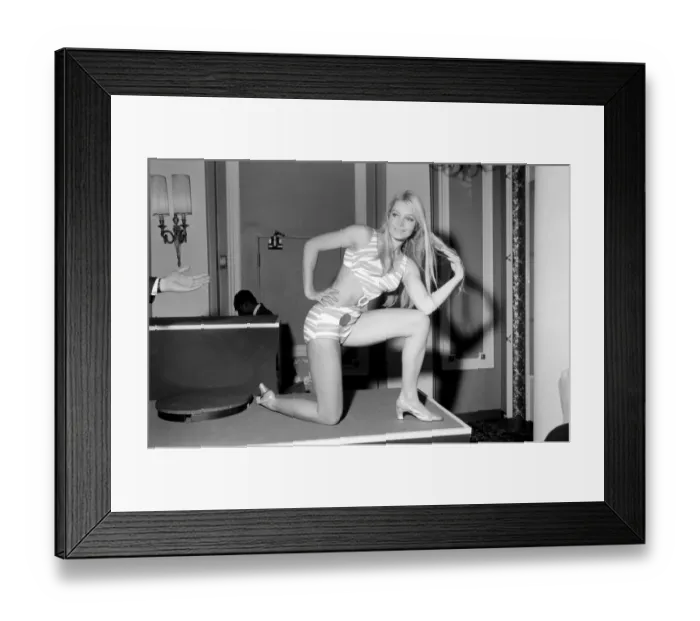 Framed Print : Miss World 1969. Miss France (foreground) wears an open-fronted costume at today Framed Print : Miss World 1969. Miss France (foreground) wears an open-fronted costume at today