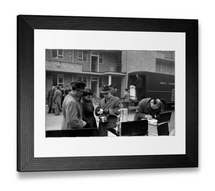 Framed Print : Door to Door Salesmen selling domestic appliances to residents on a housing estate Framed Print : Door to Door Salesmen selling domestic appliances to residents on a housing estate