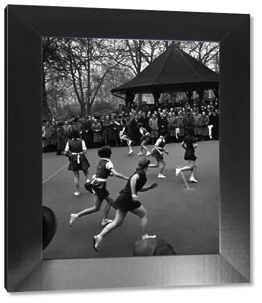 Girls playing netball In Lincolns Inn Fields. November 1952 C5606