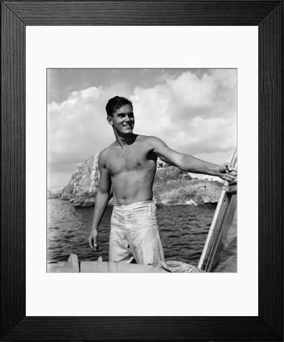 Framed Print : Actor Jeff Hunter on location with the Castand Crew of the film