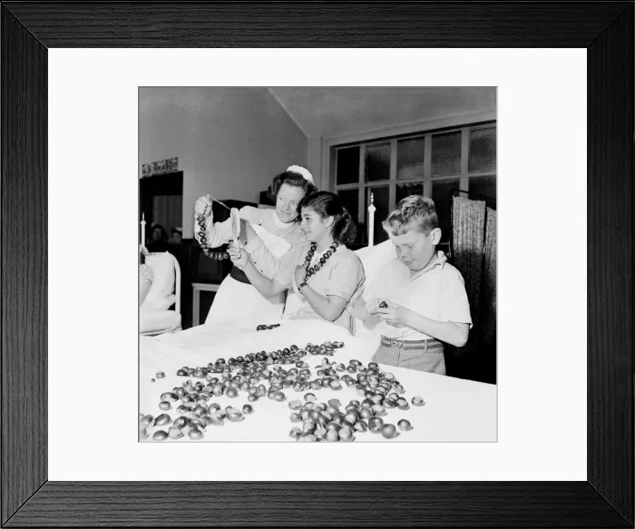 Framed Print : Children playing conkers at Royal National Orthopaedic Hospital at Stanmore