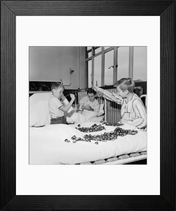 Framed Print : Children playing conkers at Royal National Orthopaedic Hospital at Stanmore
