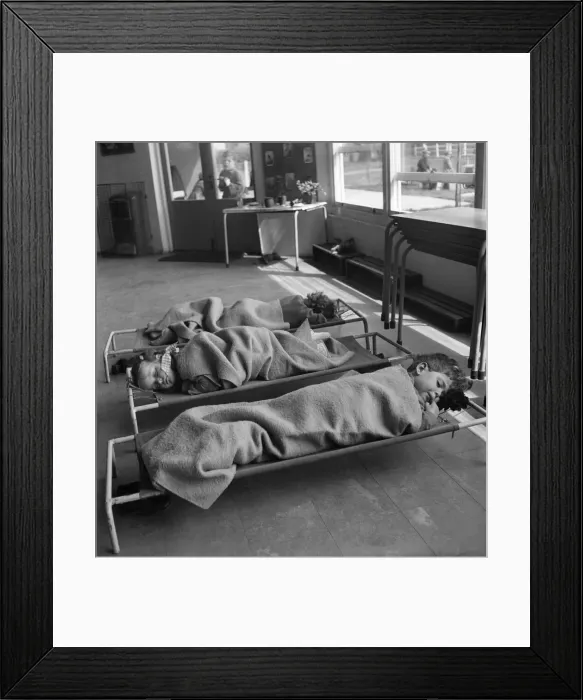 Framed Print : Children sleeping in between classes at Cookham Nursery School Framed Print : Children sleeping in between classes at Cookham Nursery School
