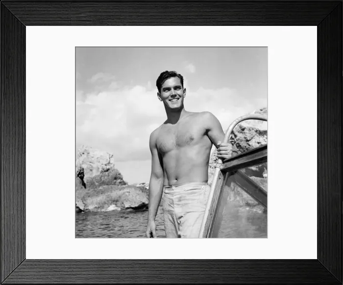 Framed Print : Actor Jeff Hunter on location with the Castand Crew of the film Framed Print : Actor Jeff Hunter on location with the Castand Crew of the film