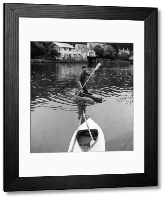 Framed Print : Canoeist Dave Pegram testing his water boots invention on the river Framed Print : Canoeist Dave Pegram testing his water boots invention on the river