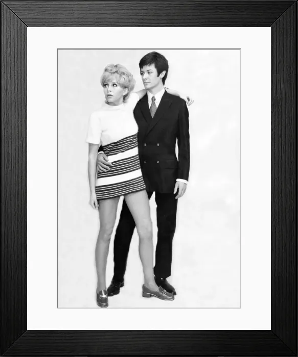 Framed Print : A young couple model the latest fashion Framed Print : A young couple model the latest fashion