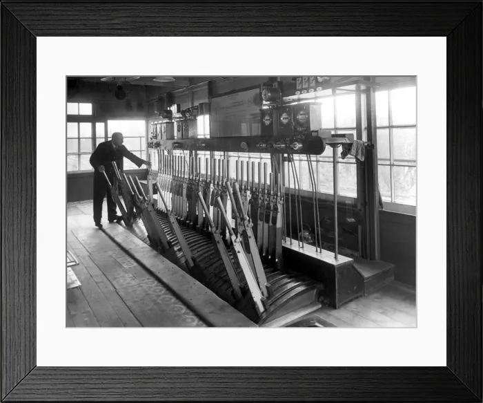 Framed Print : Signalman at work in his Signalbox. c. 1950 P044400 English Railways