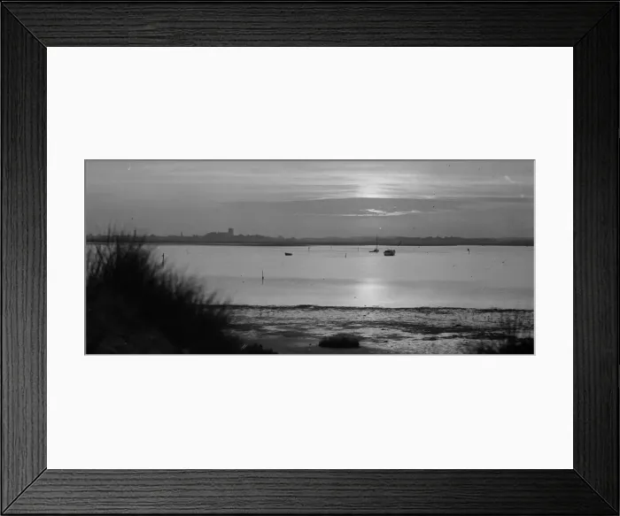 Framed Print : View of the sunset over the water at Christchurch Head in Dorset