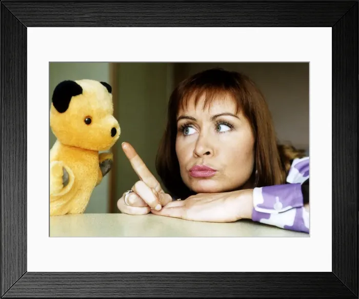 Framed Print : Sooty and Television Presenter Sian Lloyd June 1997 Celebrating Sooty Framed Print : Sooty and Television Presenter Sian Lloyd June 1997 Celebrating Sooty