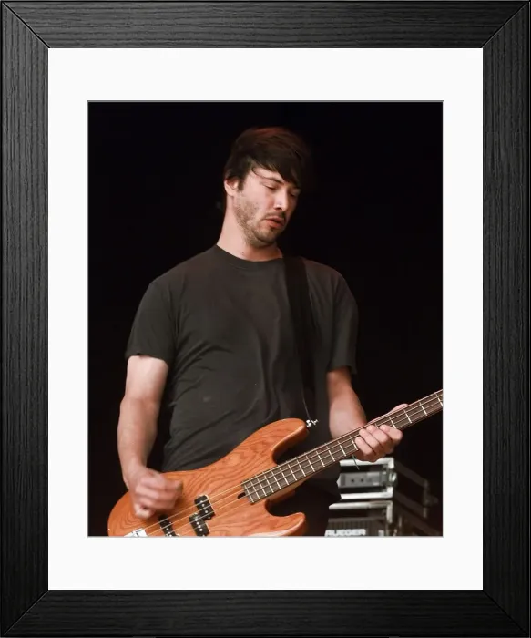 Framed Print : Keanu Reeves on stage June 1999 performing at the Glastonbury Festival with his