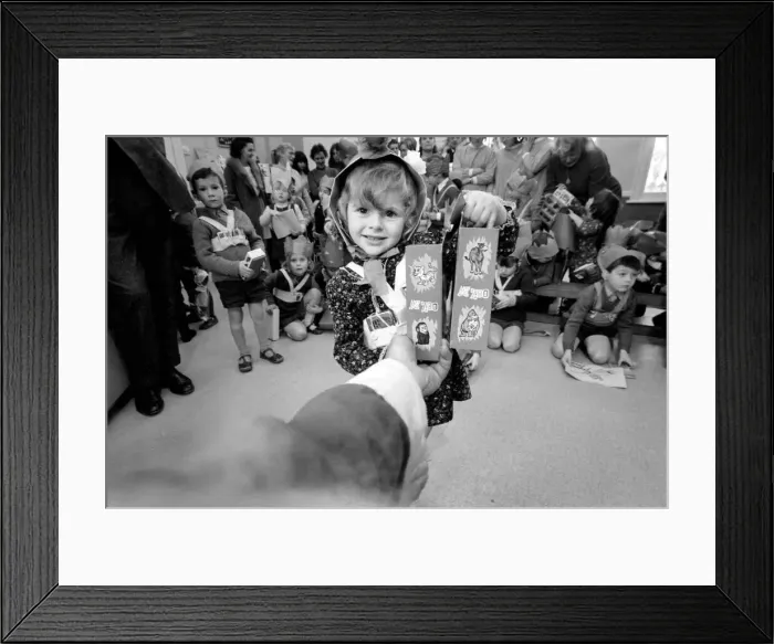 Framed Print : When Father Christmas is on duty handing out toys and gifts to children Framed Print : When Father Christmas is on duty handing out toys and gifts to children