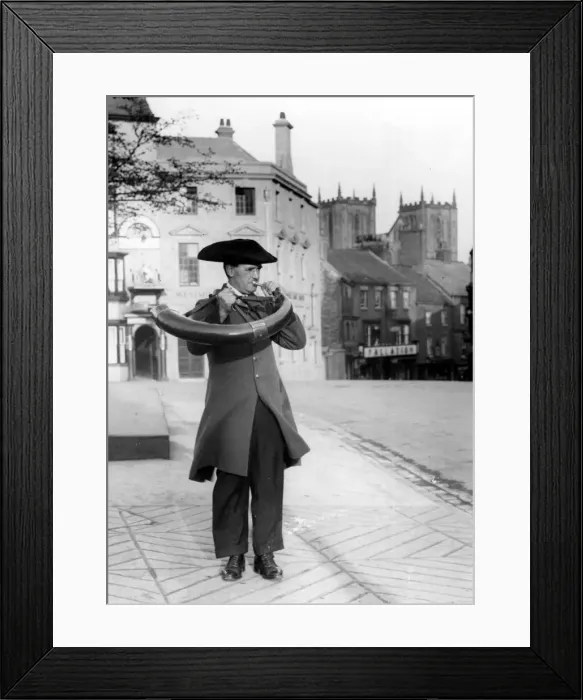 Framed Print : Character Studies. Man wearing tricolor hat and cut Jacket blowing a horn in an unknown Framed Print : Character Studies. Man wearing tricolor hat and cut Jacket blowing a horn in an unknown