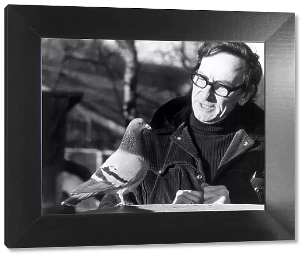 Pidge the pigeon with his owner Jack Dyson at their home in Worrall
