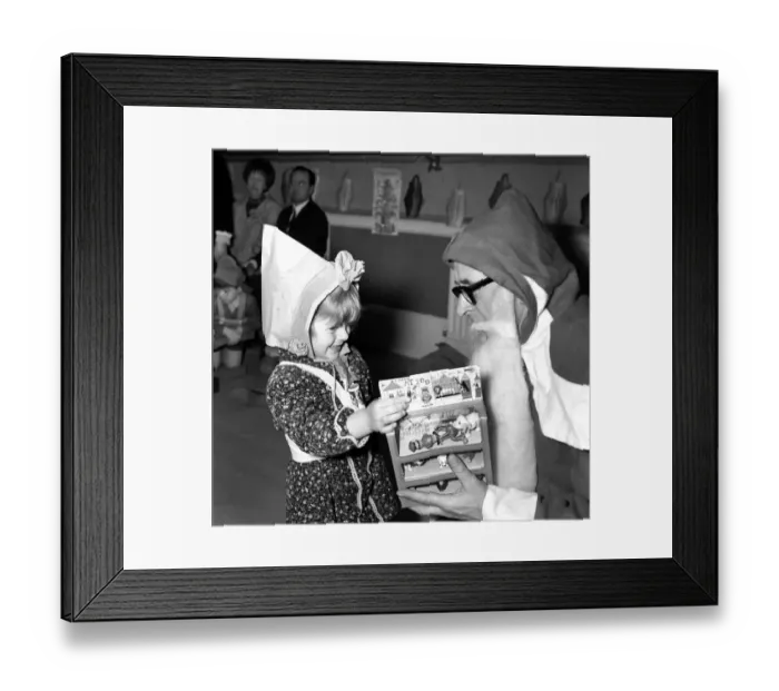 Framed Print : When Father Christmas is on duty handing out toys and gifts to children Framed Print : When Father Christmas is on duty handing out toys and gifts to children