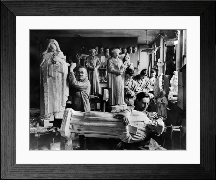 Framed Print : Family of wood carvers seen here with carvings of saints and angels
